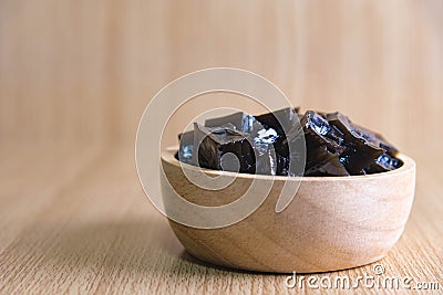 Grass Jelly on wooden table Stock Photo