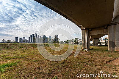Grass under the overpass,Freeway, overpass and junction Stock Photo