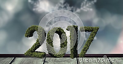 2017 in grass on wooden plank against a composite image 3D of digitally generated background Stock Photo