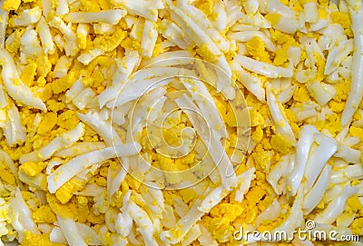 Grated hard boiled eggs, for food backgrounds or textures Stock Photo