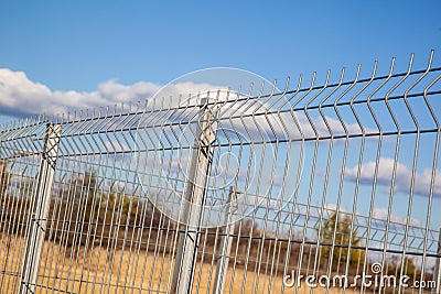Grating wire industrial fence panels, pvc metal fence Stock Photo