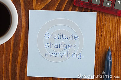 Gratitude changes everything written on a note Stock Photo