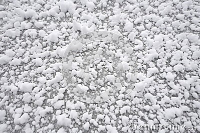 graupel snow texture on the ground Stock Photo
