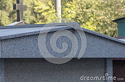 Grave crypt made of marble in a public cemetery Concept: family tomb, gravestones in the cemetery. Stock Photo