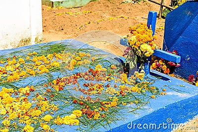 Grave decorated with flowers for All Saints Day, Guatemala Stock Photo