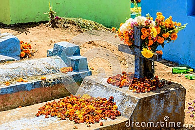 Grave decorated with flowers for All Saints Day, Guatemala Stock Photo