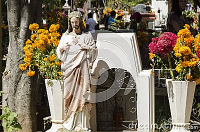 Grave decorated with flowers Editorial Stock Photo