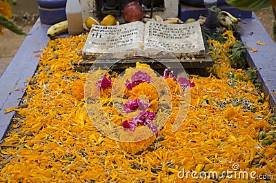 Grave decorated with flowers Editorial Stock Photo