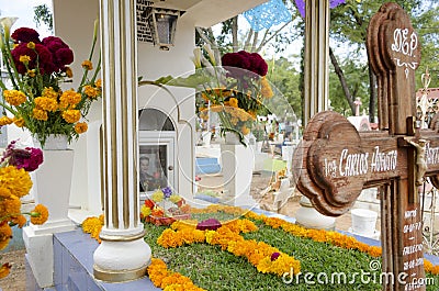 Grave decorated with flowers Editorial Stock Photo