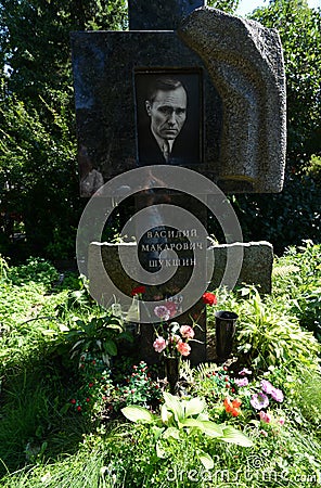 The grave of writer Vasily Shukshin at the Novodevichy Cemetery in Moscow. Editorial Stock Photo