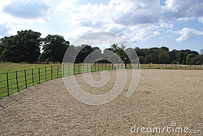 Gravel courtyard fence and gate Stock Photo