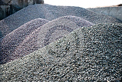 Gravel gray stone textures asphalt mix concrete in road construction. Pile rock and stone for Industrial Stock Photo