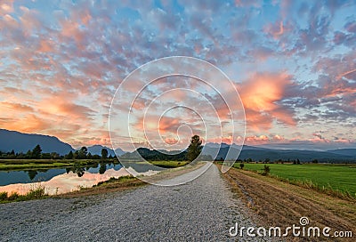 Gravel Path with Amazing Clouds Stock Photo