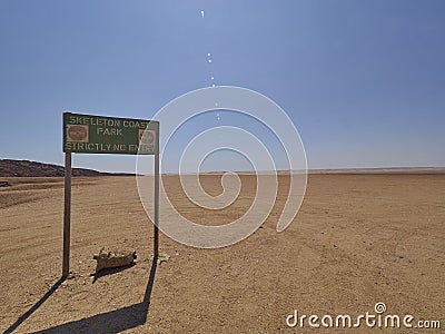 Gravel road through the arid region of the Kaokoveld Namibia Stock Photo