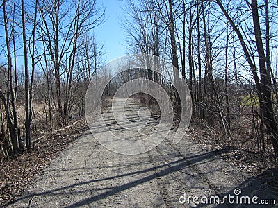 Gravel side road early spring in Canada Stock Photo
