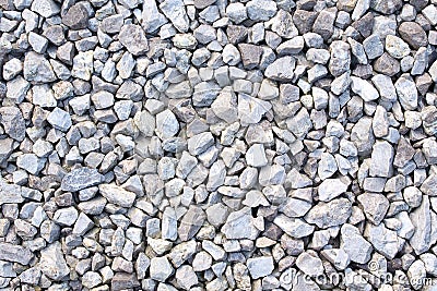 Gravel texture. Small stones, little rocks, pebbles in many shades of grey, white and blue. Texture of little rocks. Stock Photo