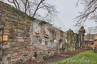 Graves on a hill at Greyfriars Kirkyard in Edinburgh Editorial Stock Photo