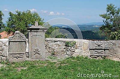 Graves at Saint Vitus Parish Church in Gracisce Stock Photo