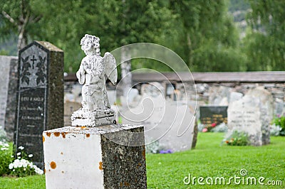 Gravestone statue of praying angel Stock Photo