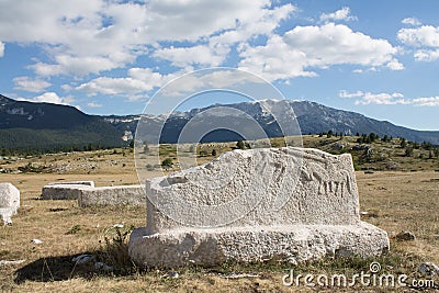 Gravestone on tableland Dugo Polje Stock Photo