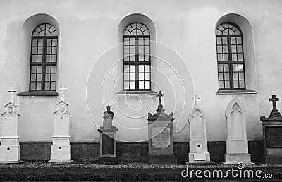 Gravestones at the church Editorial Stock Photo