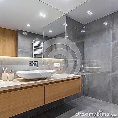 Gray bathroom with long countertop Stock Photo