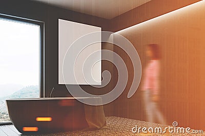 Gray bathroom, round tub, poster side view, girl Stock Photo