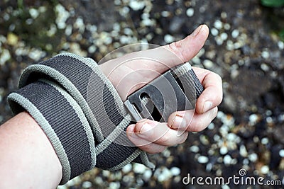 Gray belt wound on the arm on a sunny day Stock Photo