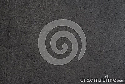 Gray-black granite countertop texture. Black background with splashes of shiny pebbles Stock Photo