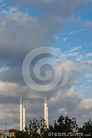 Gray color clouds partly cover the sky Stock Photo