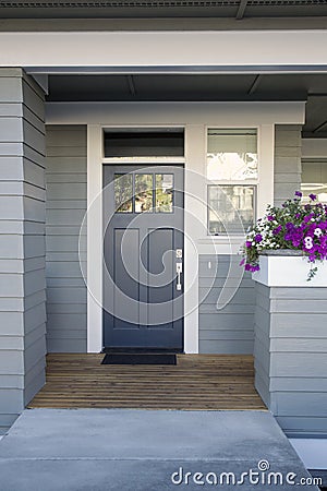 Gray front door of a home Stock Photo