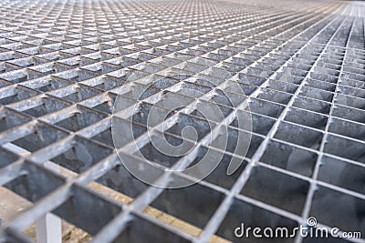 Gray galvanized iron grate, perspective view. Metal Flooring Stock Photo