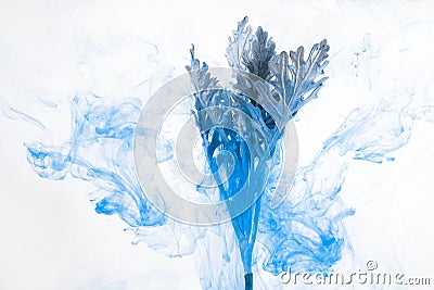 Flower water blue background white inside under paints acrylic smoke streaks grass sea haze blur underwater world planet Stock Photo