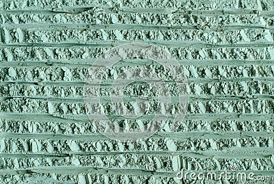 Gray, green bentonite clay powder alginate, facial mask, eye shadow, body wrap texture close up, selective focus. Stock Photo