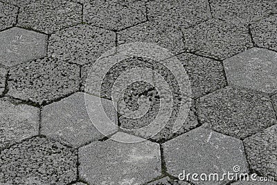 Gray interlocking paving stone driveway directly from above Stock Photo