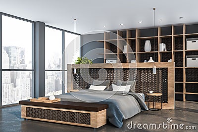Gray master bedroom corner with bookshelves Stock Photo