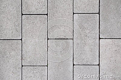 Gray paving slabs laid in straight rows. texture, background Stock Photo