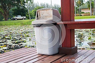 Gray plastic trash recycling container Stock Photo