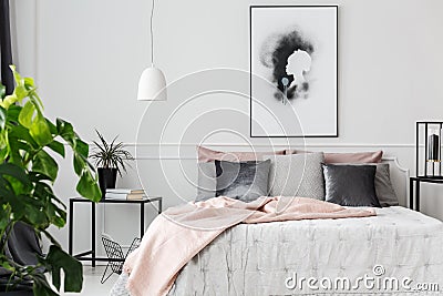 Pink blanket in feminine bedroom Stock Photo