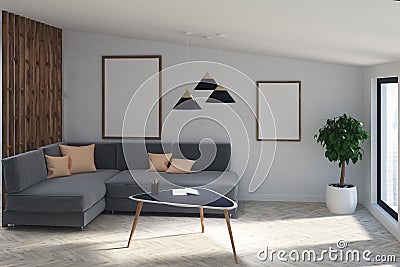 Gray sofa living room with two posters, tree Stock Photo