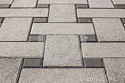 Gray street pattern outdoor tile urban perspective surface background pattern of symmetry geometric shapes copy space for your Stock Photo