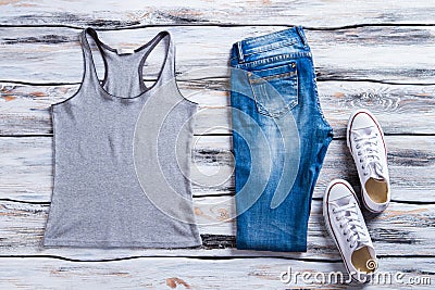 Gray tank top and jeans. Stock Photo