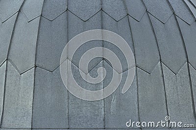 Gray tile roof floor background. Closeup roofing texture pattern. Materials to build a house for sun and rain protection. White Stock Photo