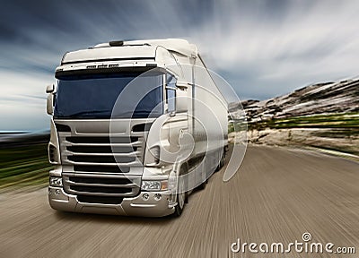 Gray truck on highway Stock Photo