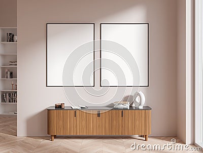 Gray and wooden cabinet with posters in beige room Stock Photo