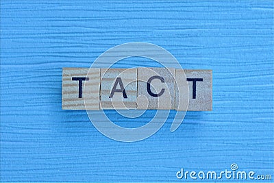 Gray word tact from small wooden letters Stock Photo