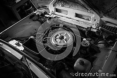 Grayscale high angle shot of an old car engine interior Stock Photo