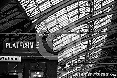 Grayscale shot of the metal lattice roof of Brighton railway station, England Editorial Stock Photo