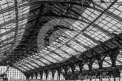 Grayscale shot of the metal lattice roof of Brighton railway station, England Editorial Stock Photo