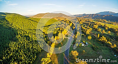 Great Alpine Road passing through Australian countryside at suns Stock Photo